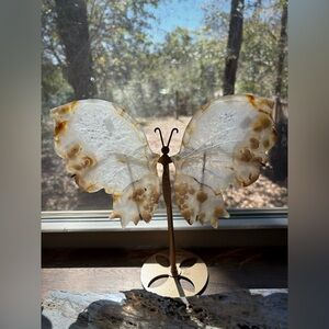 flower agate,pink amethyst with golden healer butterfly wings on a metal stand
